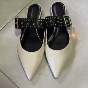 Black and white slip on mules